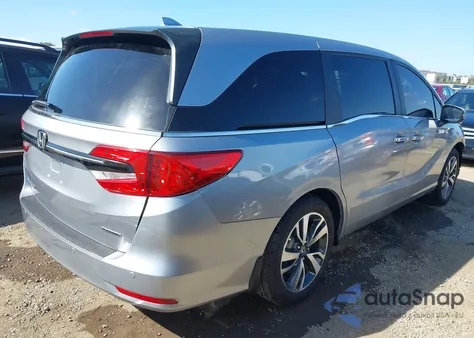 2023 Honda Odyssey Touring z USA, uszkodzony, nr VIN 5FNRL6H89PB000246